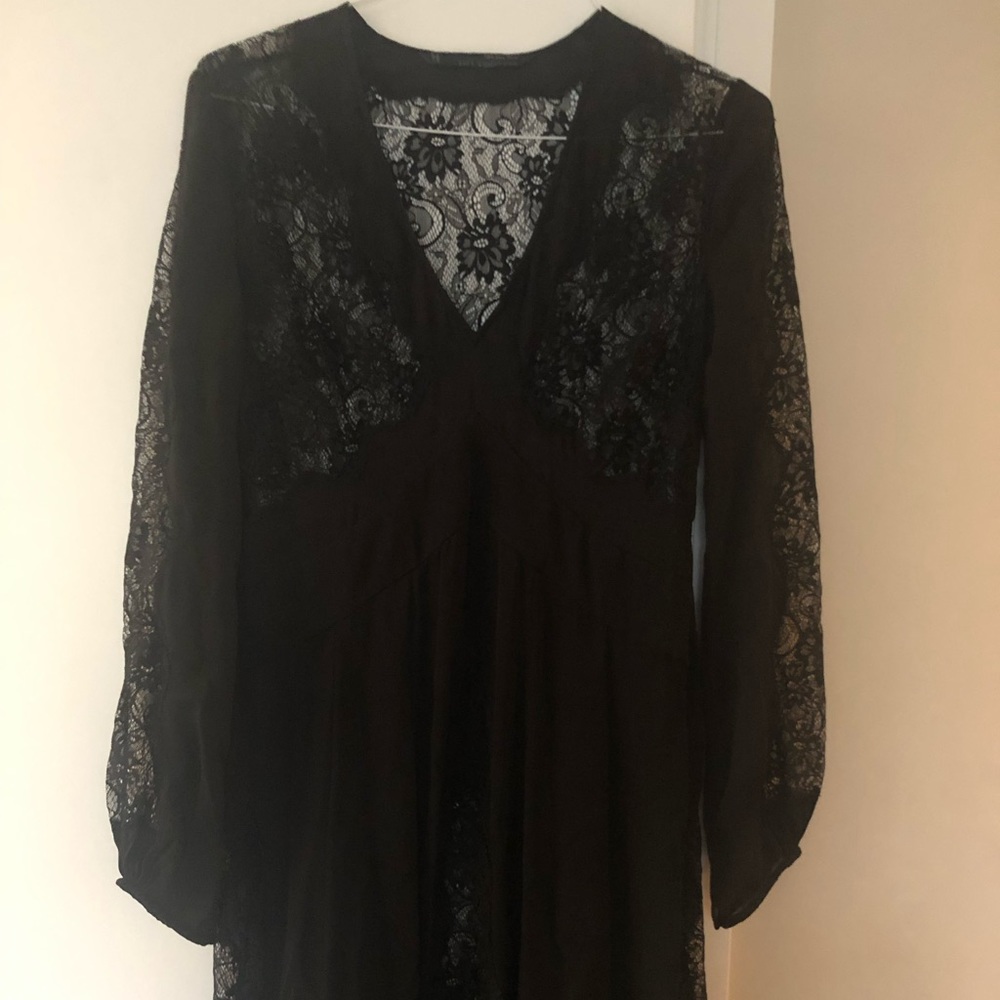 This dress has been worn once.